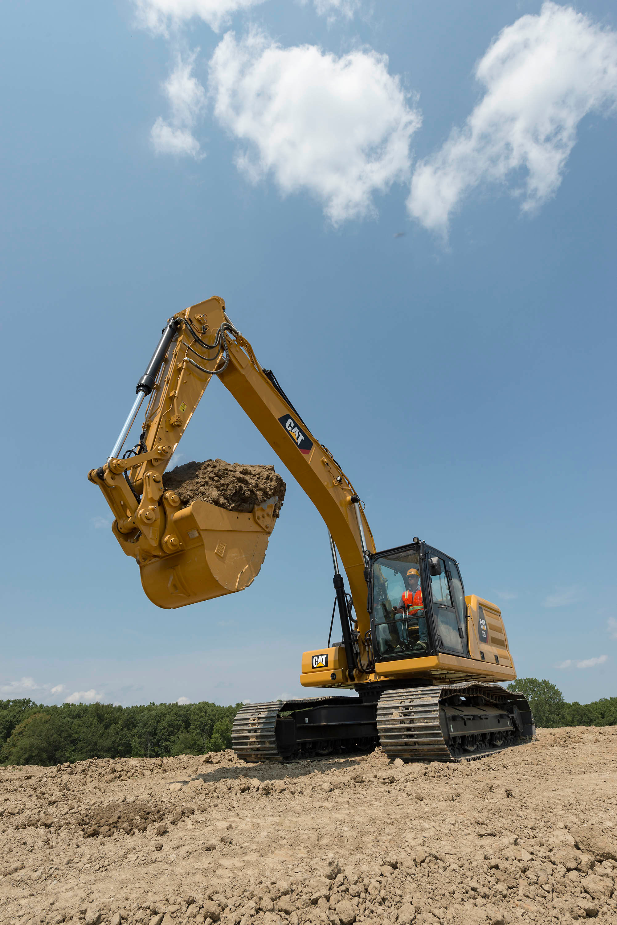 Работа на экскаваторе. Экскаватор Caterpillar 404. Катерпиллер экскаватор 200е. Экскаватор в работе. Ролики экскаватора.